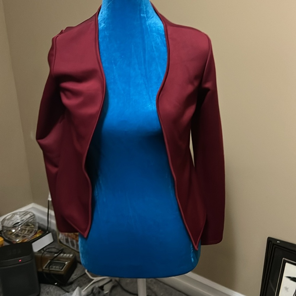 Size small maroon suit jacket. This would be at your waist